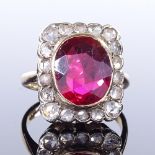 A 9ct gold ruby and rose-cut diamond cluster panel ring, openwork bridge, maker's marks CR,