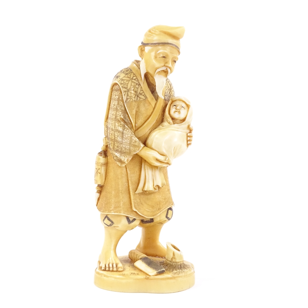 A Japanese 2-tone stained ivory okimono, man carrying an infant, Meiji period, signed under base, - Image 2 of 8