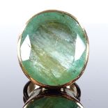 A large handmade 18ct gold solitaire emerald dress ring, oval-cut emerald approx 50ct, in