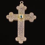 A French? unmarked gold emerald crucifix pendant, pierced and engraved scrollwork decoration with