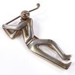 An Evald Nielsen Danish silver figural golfer brooch, stylised form, maker's marks En, 830 S