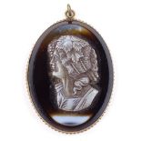 A relief carved cameo agate panel pendant, depicting female bust, in gilt-metal frame, pendant