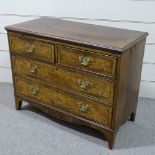 A 19th century burr-walnut chest of 2 long and 2 short drawers, with feather-banded inlay, width 3'
