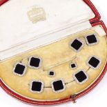 An Art Deco unmarked white metal onyx and diamond dress set, comprising a pair of cufflinks, a