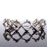 An Andreas Daub Danish sterling silver bracelet, stylised matte and polished form, stamped A*D,