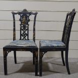 A pair of Chinese Chippendale style carved gilded and lacquered hall chairs