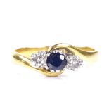 A 22ct gold 3-stone sapphire and diamond crossover ring, platinum-topped settings, hallmarks