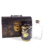 An 18th century gilded and lacquer wood dome-top tea caddy with brass carrying handle, the