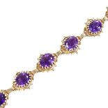 A 14ct gold amethyst bracelet, pierced panel settings, bracelet length 17.5cm, 16.7g