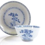 A Chinese Nanking Cargo blue and white porcelain tea bowl and saucer, bowl diameter 7.5cm,