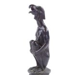 A patinated bronze sculpture of a crouching eagle-headed figure, unsigned, height 19cm