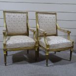 A pair of 19th century French carved giltwood-framed open armchairs