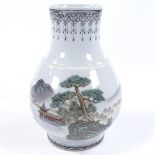A Chinese Republic Period white glaze porcelain vase, with painted mountain landscape, height 19cm