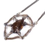 A Vintage 1960s brutalist oversized silver plated amber pendant necklace, double plated chain with