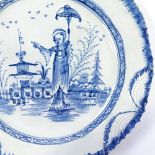 A 19th century Pearlware plate, decorated with an Oriental figure in landscape, no factory marks,