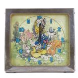 A Walt Disney Donald Duck design Glen clock, made in Scotland, chrome plate frame, height 13cm