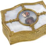 An ornate gilt-metal jewel box, circa 1900, the lid having a watercolour miniature portrait of a