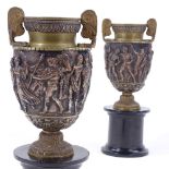 A pair of 19th century relief moulded bronze Classical urns, by John Grinsell & Sons of