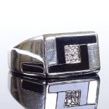 A modern 9ct white gold diamond cluster onyx signet ring, onyx panel shoulders, maker's marks CLE,