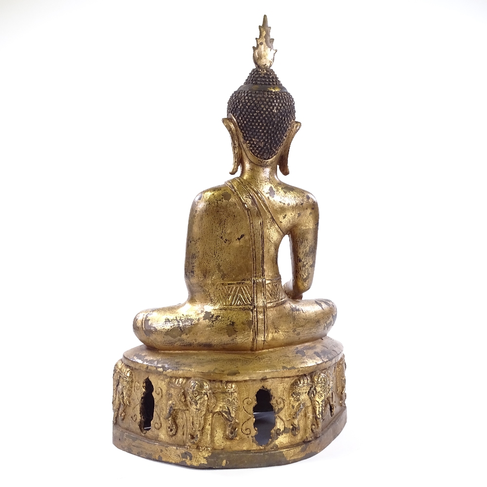 An Oriental gilt-bronze heavy gauge seated Buddha, height 56cm - Image 3 of 3