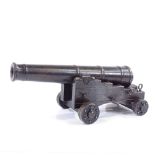 A scratch-built metal model field cannon on metal carriage base, overall length 19cm