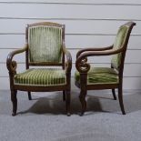 A pair of 19th century French Empire style mahogany elbow chairs