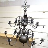 A large Dutch style brass 12-branch chandelier, height 95cm