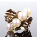 An Art Deco style 14ct gold pearl dress ring, openwork stylised shoulders, possibly Mikimoto,