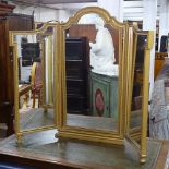 A large beaded-edge and gilt-framed 3-fold dressing table mirror