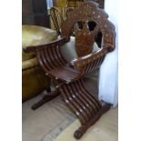 An Anglo Indian brass inlaid Savonarola chair