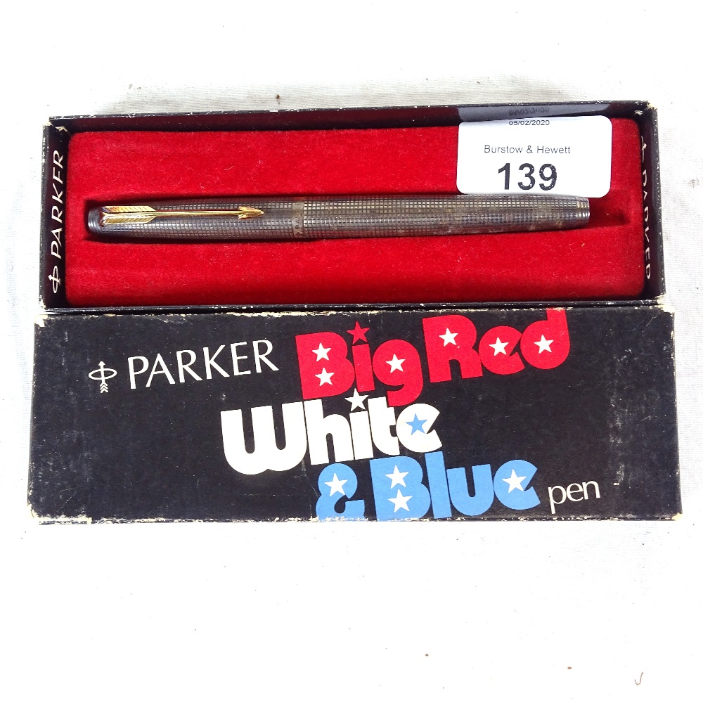 A sterling silver Parker Big Red White and Blue fountain pen with 14ct nib, boxed