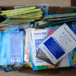 A boxful of football programmes, including Brighton and Hove, and Sidley United