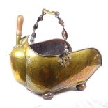 A Victorian swing-handled brass coal scuttle and shovel, and other fireside items