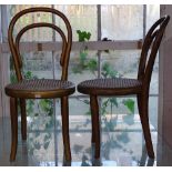 A pair of Thonet children's bentwood chairs