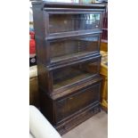 An early 20th century oak 4-section Globe-Wernicke bookcase, with drawer fitted base, W87cm, H157cm