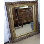 An Antique carved giltwood and gesso rectangular wall mirror, W81cm, H95cm