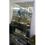 An Art Deco style bevelled-edge wall mirror, 91cm x 119cm