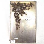 A rectangular Russian plated book mount, with cast acanthus leaf applied decoration, dated 1904,