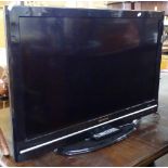 A Techwood 37" flat screen television with remote