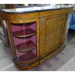A Victorian burr-walnut and ebonised credenza, having bow-end glazed doors and centre panelled