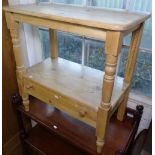 A polished pine 2-tier side table, with drawer fitted to the base, W66cm, H73cm