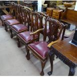 A set of 10 reproduction mahogany dining chairs, with carved rails and backs, leather drop-in