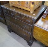 A small 18th century oak chest of 2 short and 2 long drawers, on bracket feet, W79cm, H80cm