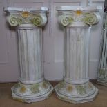 A pair of composite Corinthian column pedestals, H76cm, W34cm