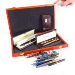 Various fountain and ballpoint pens, including Parker and Sheaffer