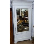 A large Continental painted pine armoire, with pinn-hinged mirrored door, W100cm, H220cm