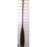 A carved wood oar, length 153cm