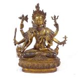 A polished gilt-bronze seated Buddha, with inset coral and turquoise stones, height 23cm