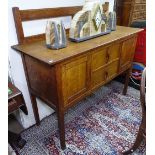 A Gordon Russell Arts and Crafts Cotswold School sideboard, in oak and cedar, designed by Gordon