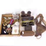 A collection of militaria, including Ehrhardt pocket watch, leather-covered headset lining, flying